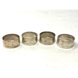 Four silver plated napkin rings