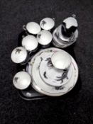 Thirty-eight pieces of Royal Albert Night and Day bone tea china together with two further china
