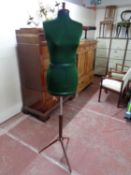 A dressmaker's dummy on stand