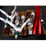 Two boxes containing three plastic duck in flight figures, contemporary ornaments,