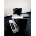 A Bose surround sound system with sub woofer together with a Bose lifestyle VS-2 video enhancer,