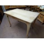 A blonde oak dining table