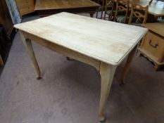 A blonde oak dining table