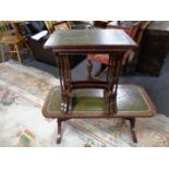 A leather topped coffee table together with a nest of three leather topped tables