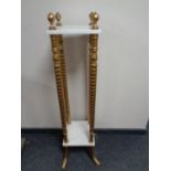 A gilt and marble two tier plant stand