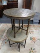 Two folding eastern brass topped tables