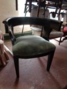 An antique oak elbow chair