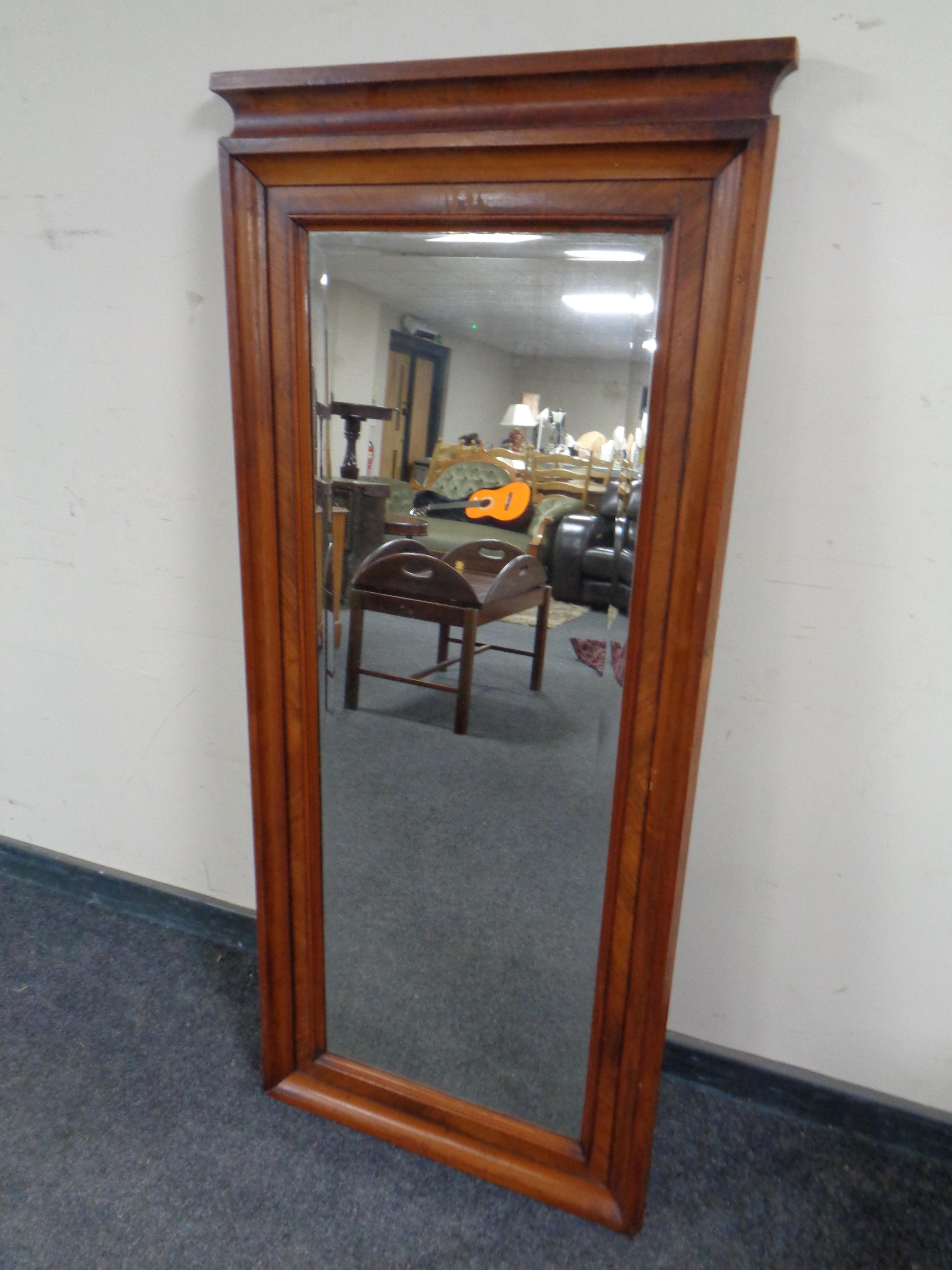 A 19th century walnut framed bevel edged hall mirror