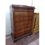 A 19th century continental mahogany seven drawer chest