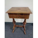 A 19th century continental mahogany work table