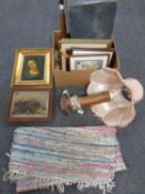 A box containing vintage luggage case, assorted pictures, wooden table lamp,