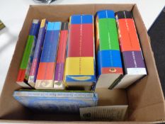 A box containing ten Harry Potter books