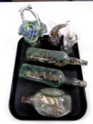 A 20th century ship in dimple whisky bottle together with two other dioramas in bottles,
