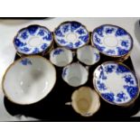A tray containing thirty-four pieces of 19th century blue and white gilt rimmed tea china