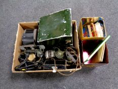 A box containing tin cased Aldis projector, stenographer's headphones,