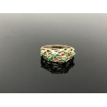 A 9ct gold textured ring set with turquoise, size P. CONDITION REPORT: 2.