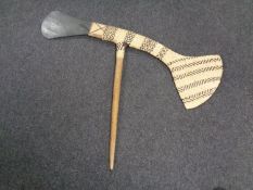 A New Guinea Western Highlands ceremonial stone axe with wicker work,