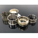 Five silver plated napkin rings (5)