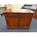 A Strong Bow Furniture inlaid yew wood double door sideboard fitted two drawers