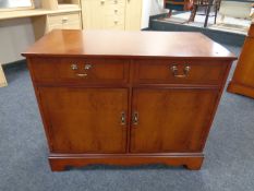 A Strong Bow Furniture inlaid yew wood double door sideboard fitted two drawers
