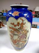 A large Chinese vase depicting birds