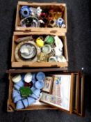 Three boxes containing miscellaneous china and pictures, seven inch singles, Spode bells,