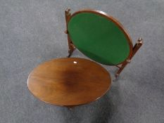 A 20th century oval occasional table on Queen Anne legs together with a folding oak card table