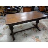 An oak refectory dining table on bulbous legs