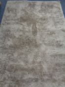 A John Lewis hand made shaggy pile rug