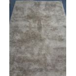 A John Lewis hand made shaggy pile rug