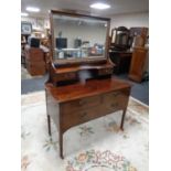 An Edwardian mahogany dressing chest with mirror by Robson's of Newcastle