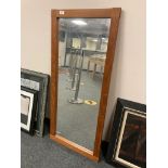 A 20th century teak framed mirror,