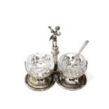 A vintage silver plated cruet with cherub standing on pillar