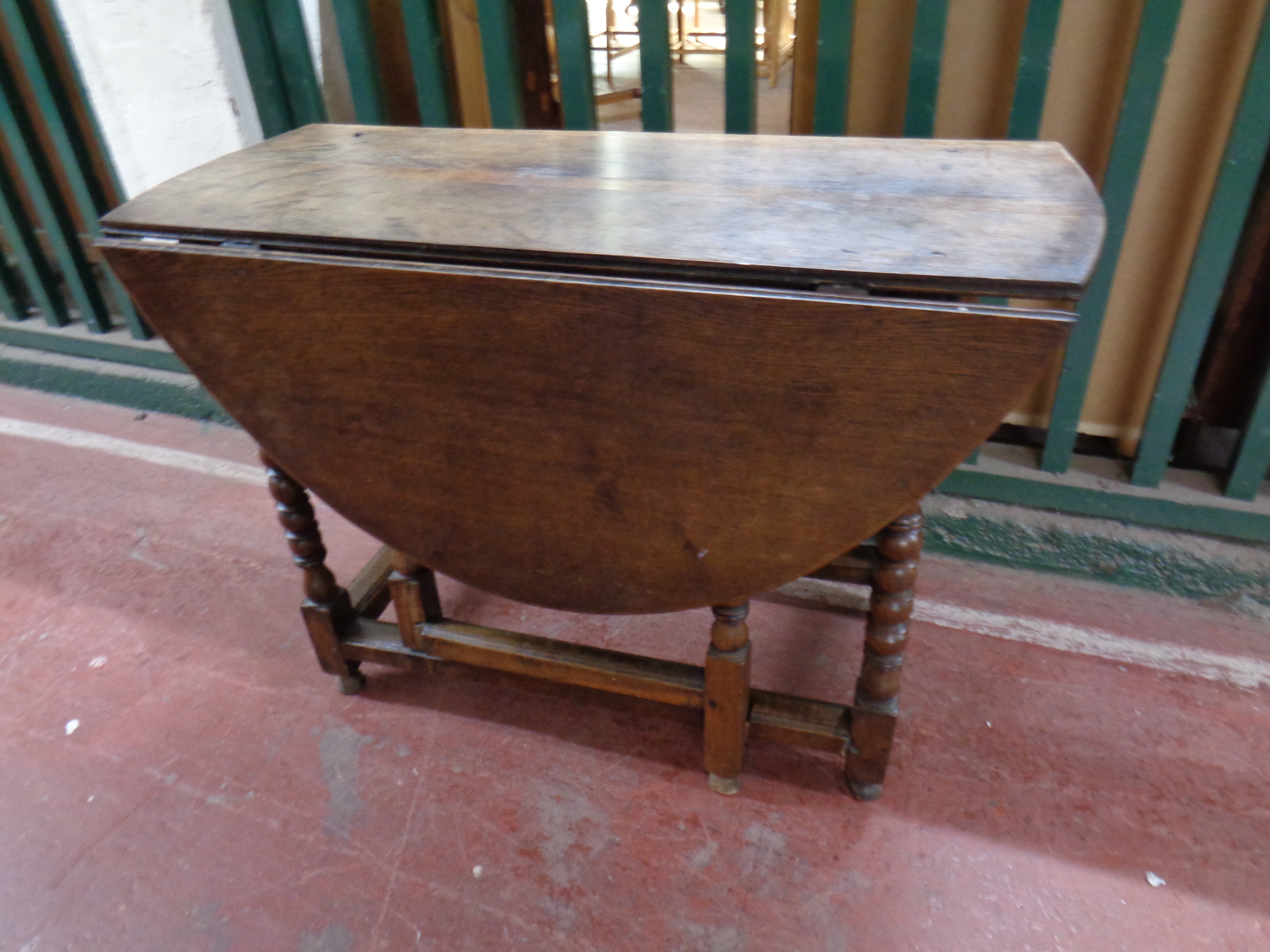 A 19th century oak gate leg table