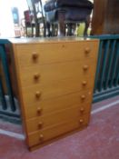 A mid 20th century teak six drawer chest