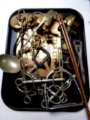 A tray of miscellaneous to include horse bits, stirrups, plated ladle, pair of miniature axes,