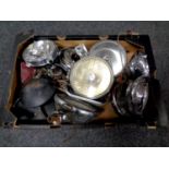 A box of vintage car head lamps