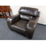 A brown leather armchair