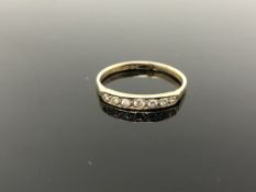 A 9ct gold diamond half-eternity ring, size Q CONDITION REPORT: 1.