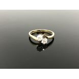 A 14ct gold two stone CZ crossover ring, size P CONDITION REPORT: 2.