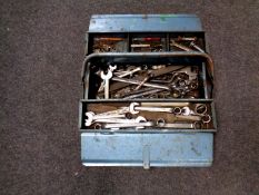 A metal concertina toolbox containing a large quantity of assorted spanners