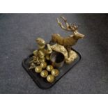 A tray containing assorted brass ware to include figure of a stag,