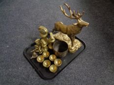 A tray containing assorted brass ware to include figure of a stag,