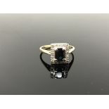 A diamond and sapphire cluster ring, size P CONDITION REPORT: Marks rubbed. 4.