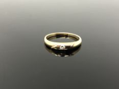 A 9ct gold diamond solitaire ring, size Q. CONDITION REPORT: 2.