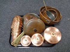A tray of assorted copper ware to include kitchen storage jars, brass handled pans,