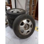A set of four Good Year Ultra Grip Rotation 225/65 R17 Winer/Snow Tyres, on steel Honda rims.