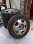 A set of four Good Year Ultra Grip Rotation 225/65 R17 Winer/Snow Tyres, on steel Honda rims.