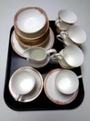 A tray containing 27 pieces of Royal Doulton Darjeeling tea china