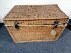 An early 20th century wicker hamper